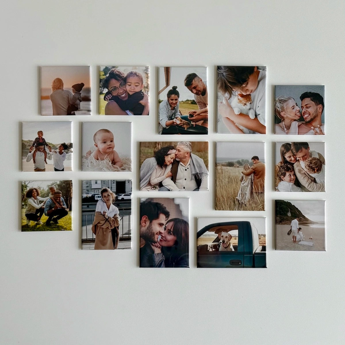 Custom photo magnet collage by Milestone Magnets on a magnetic gallery wall, featuring families, pets, and memories as lasting keepsakes and souvenirs.