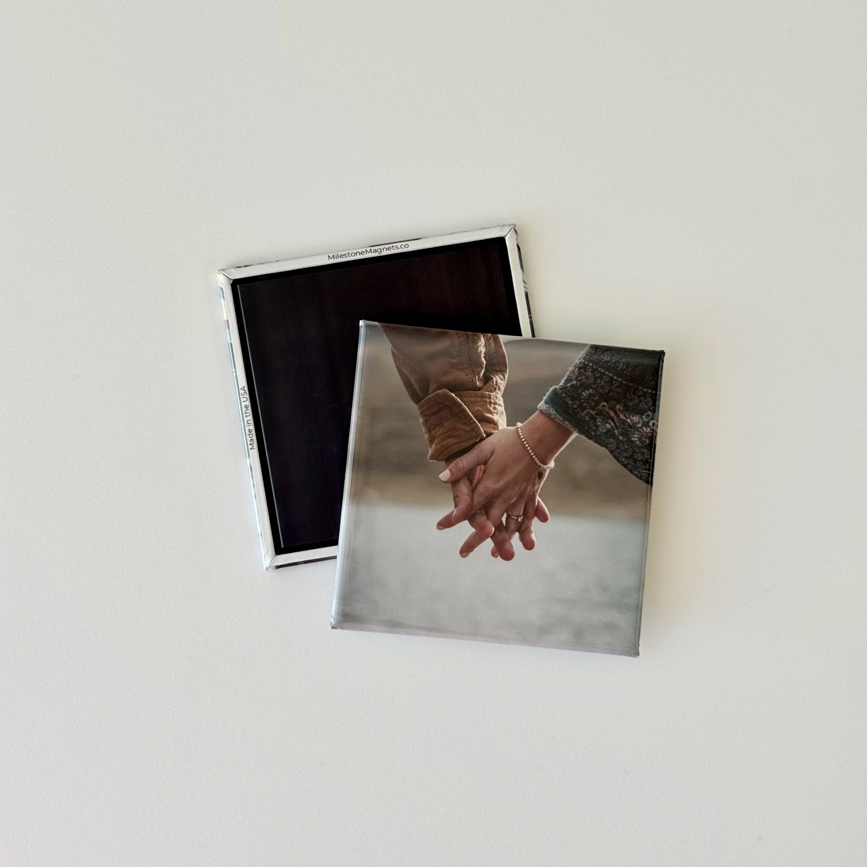 High-quality custom photo magnet by Milestone Magnets shown close-up with glossy professional print, crisp image detail, and durable magnetic backing—ideal for preserving personal moments as keepsakes or display-ready fridge souvenirs.